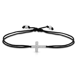 “Croix” 14-karat gold cross with diamonds on silk cord bracelet