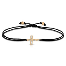 Load image into Gallery viewer, “Croix” 14-karat gold cross with diamonds on silk cord bracelet