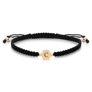 “Clairette” 14-karat gold hexagon with engraving on silk cord bracelet