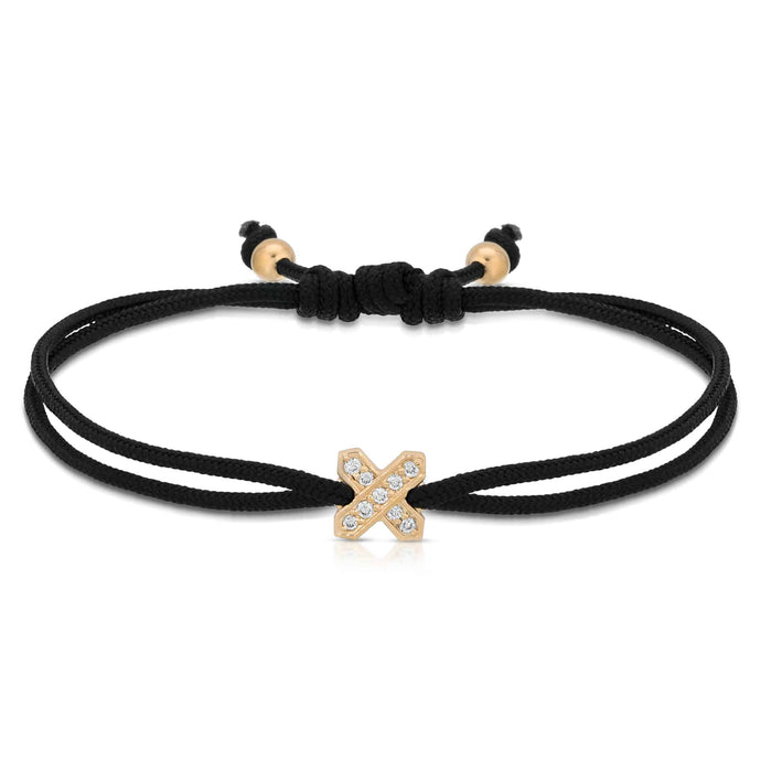 “Equis” 14-karat gold X with diamonds on silk cord bracelet