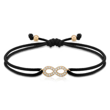 Load image into Gallery viewer, “Eve” 14-karat gold infinity sign with diamonds on silk cord bracelet