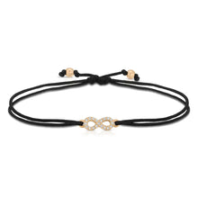 Load image into Gallery viewer, “Evette” 14-karat gold infinity sign with diamonds on silk cord bracelet